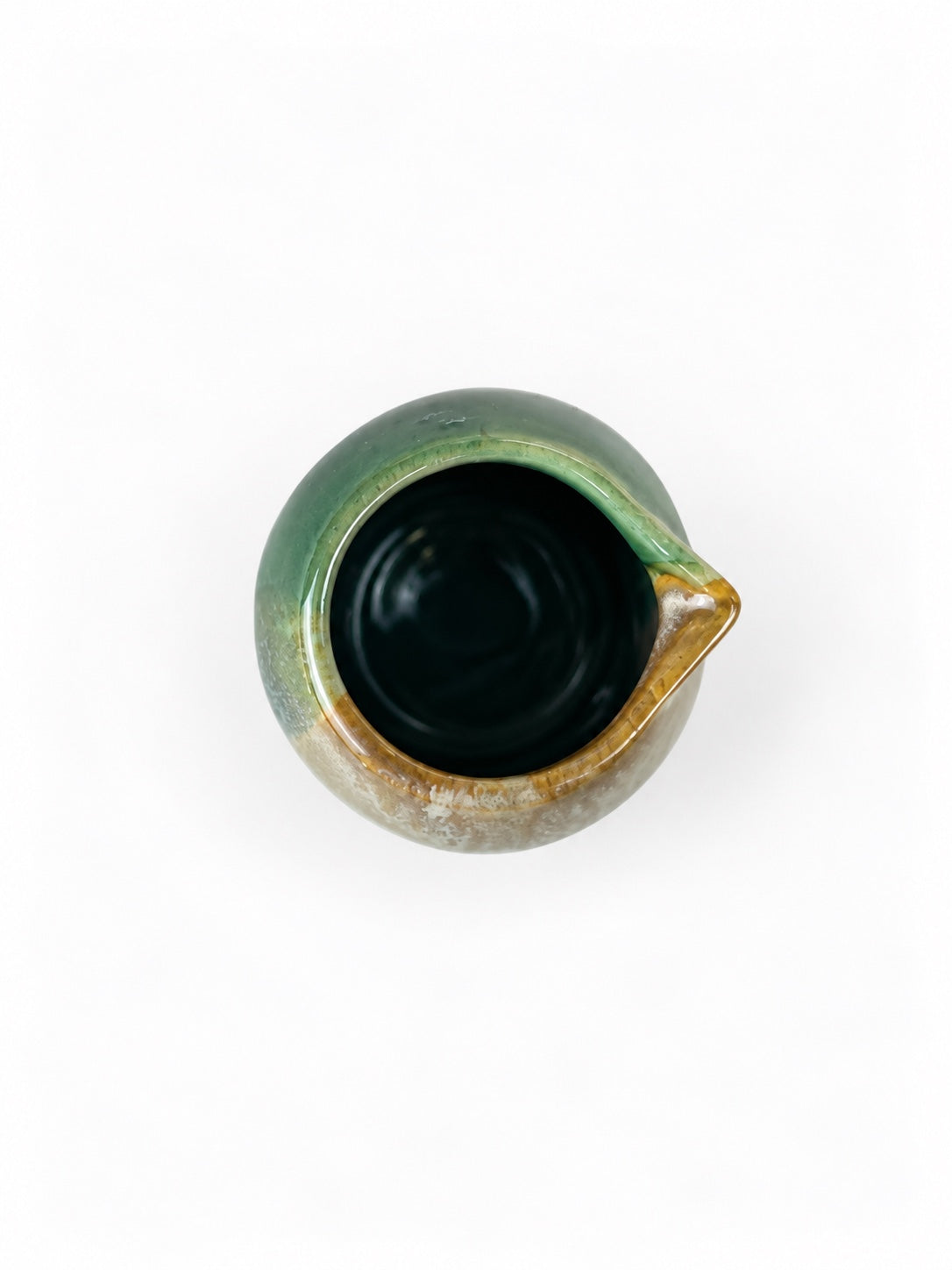 Açores Portuguese stoneware milk and sauce jug, top view showing reactive glaze interior