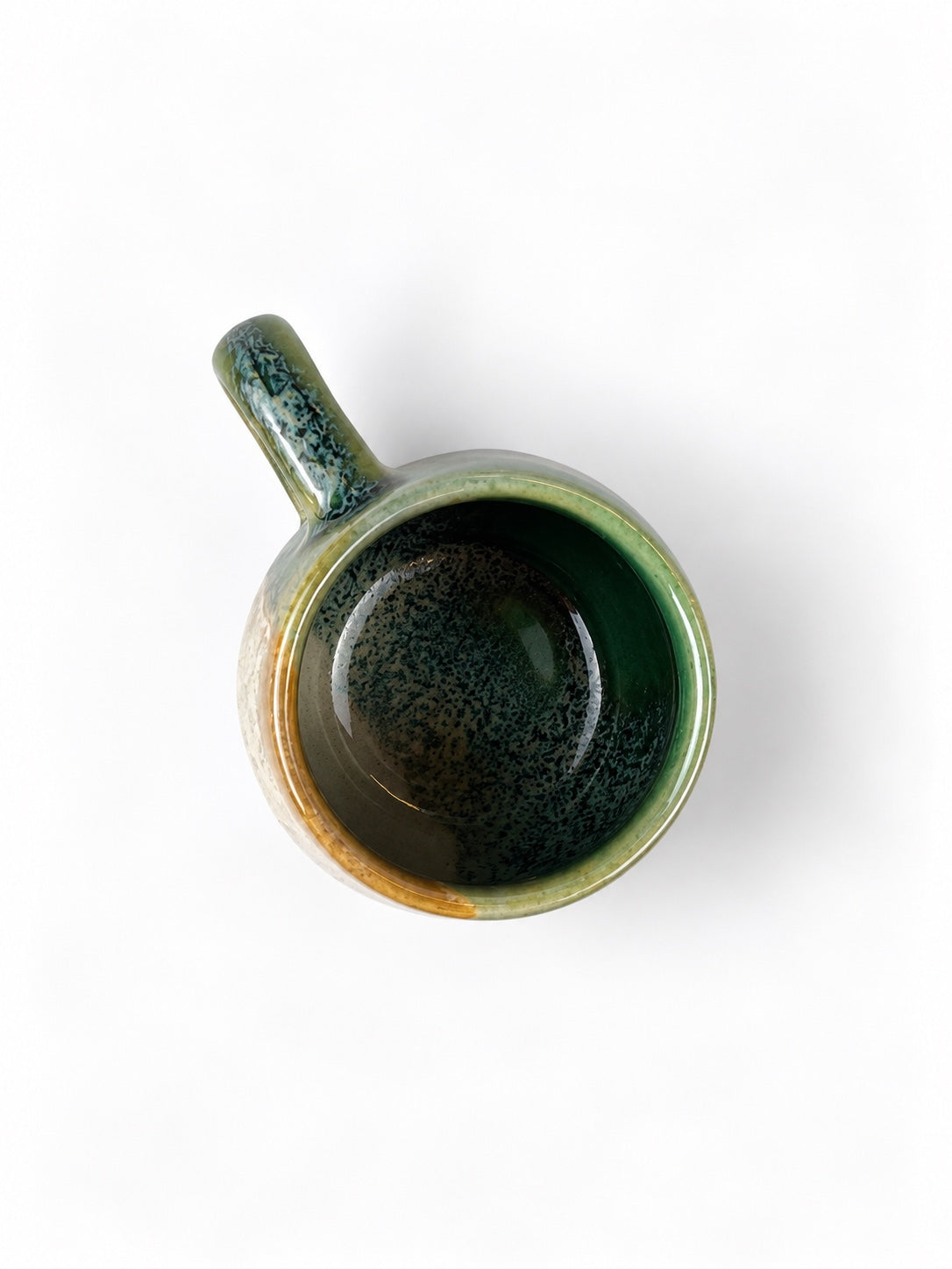 Açores Portuguese stoneware espresso cup, top view showing reactive glaze interior